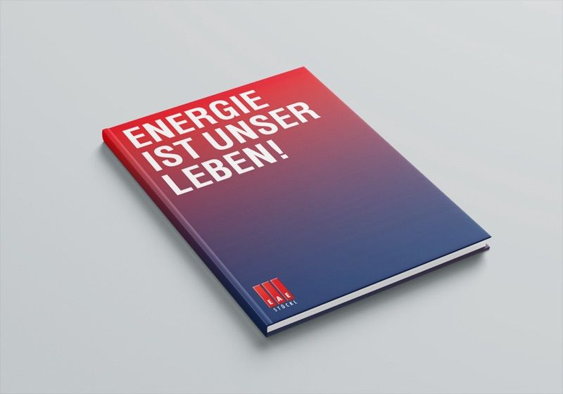 Visualisierung: Notizbuch von EAE Stöckl mit dem Titel „Energie ist unser Leben!“
